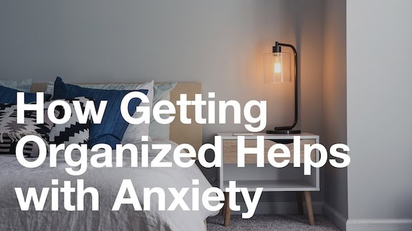Text "How Getting Organized Helps with Anxiety" over bedroom photo