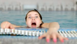 Comedic photo of mom drawing in water representing how mom's need help with organizing home and life