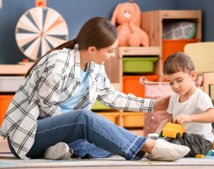 Organized family with mother and son playing together